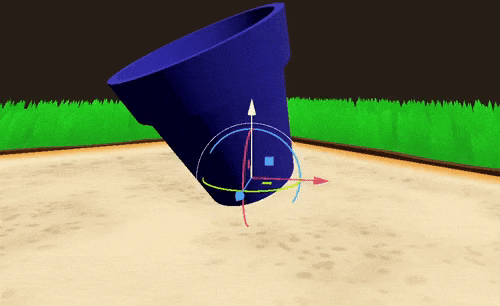 A plastic bucket on the sandbox.